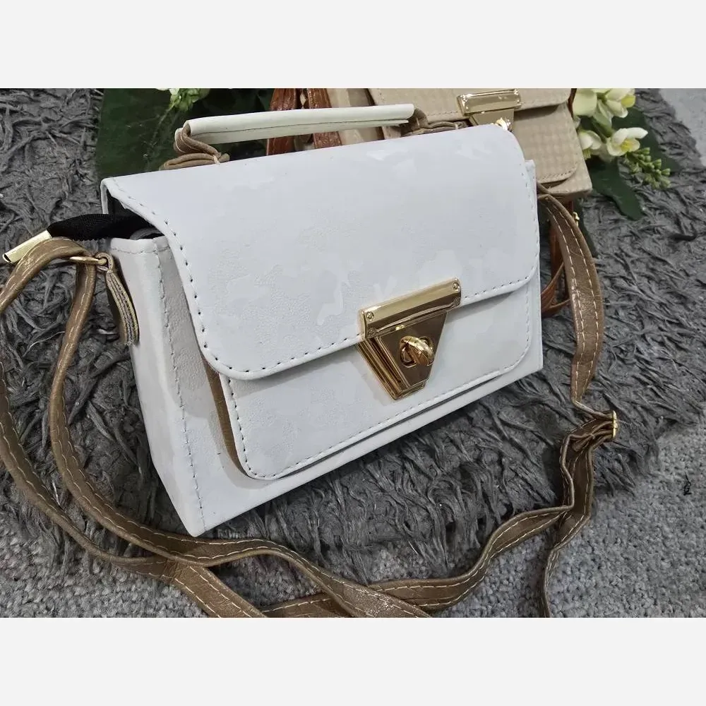 کیف شادگان چرم نانسی کیفیت عالی رنگ مشکی سفید کرم