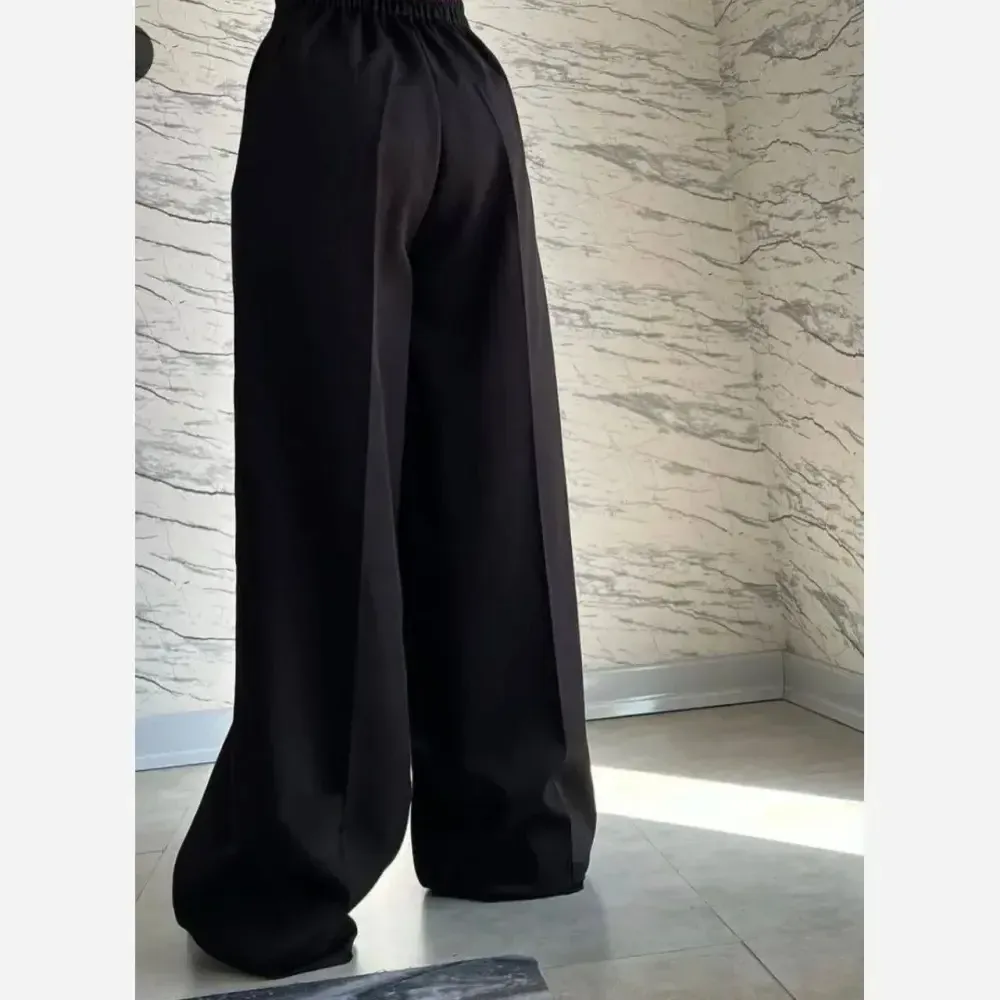 شلوار بگ زنانه پارچه مازراتی رنگ مشکی قد 100 سایز 40 تا 48