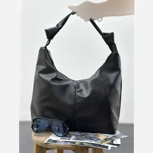 کیف بند گره ای چرمی زنانه سبک و جادار رنگ مشکی و موکا