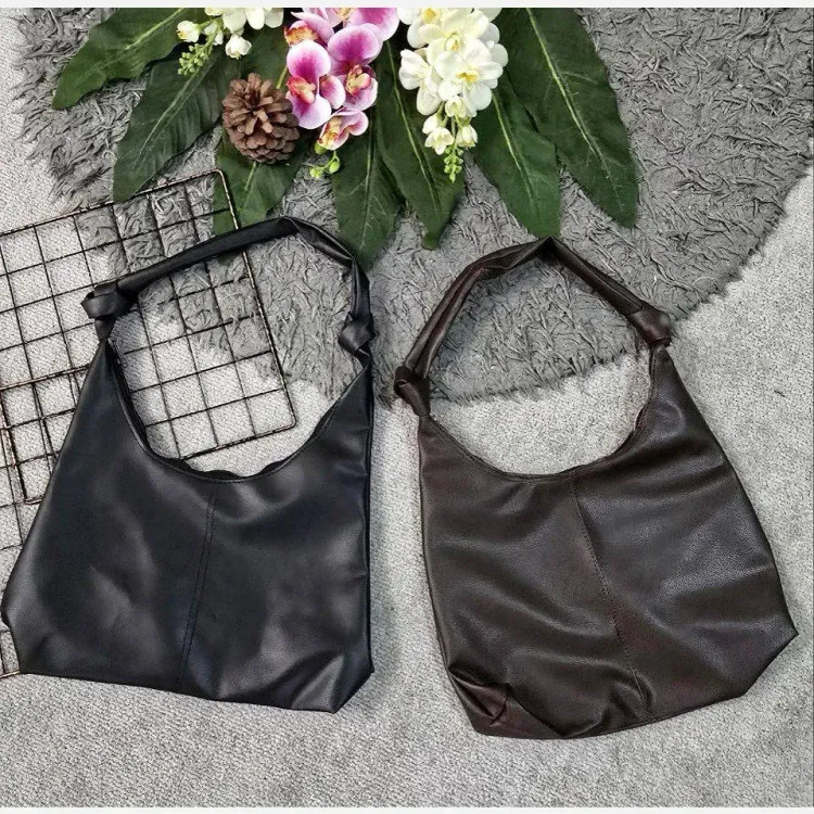 کیف بند گره ای چرمی زنانه سبک و جادار رنگ مشکی و موکا