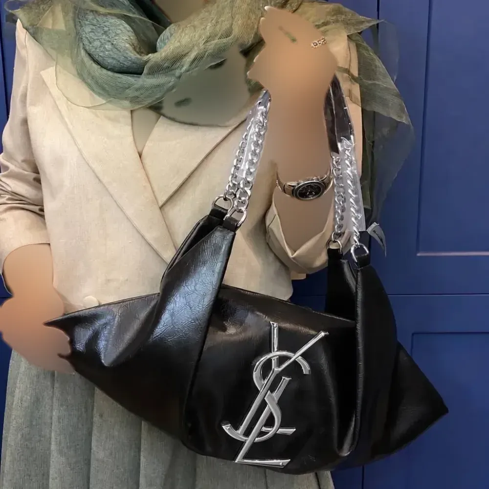 کیف زنانه یاشیل چرم با کیفیت مجلسی و اسپرت رنگ طلایی و نقره ای