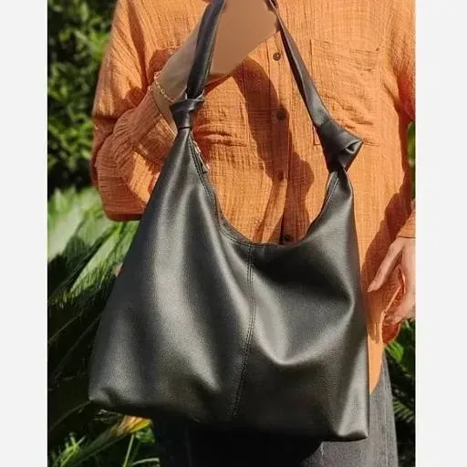 کیف چرم بند گره ای زنانه مشکی و موکا سایز 30*40 سانت سبک و جادار با کیفیت عالی